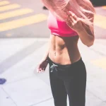 a fit girl with pink top